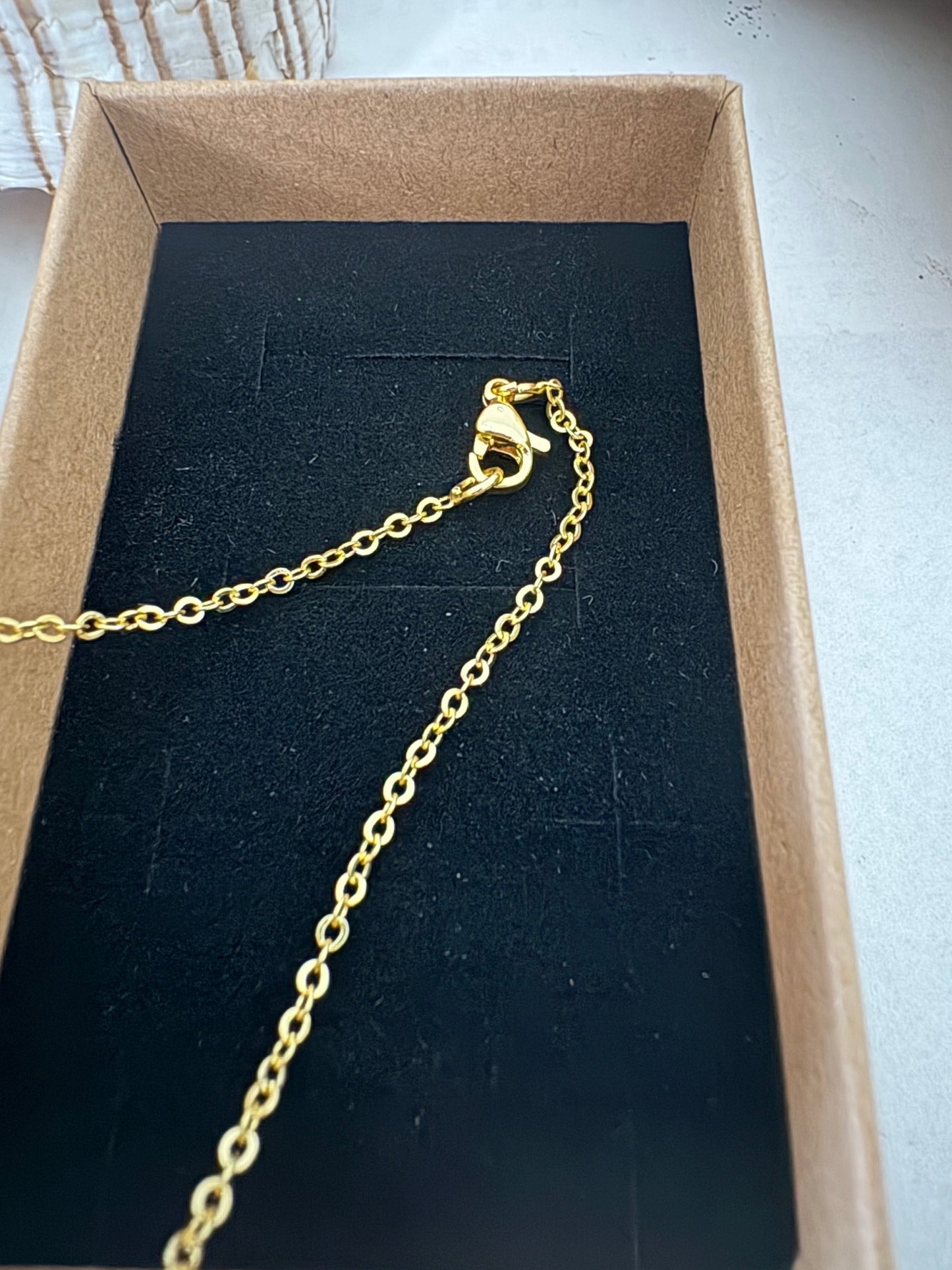 Vintage-Halskette mit Ammonitenfossil-Anhänger aus Madagaskar, vergoldete Kette